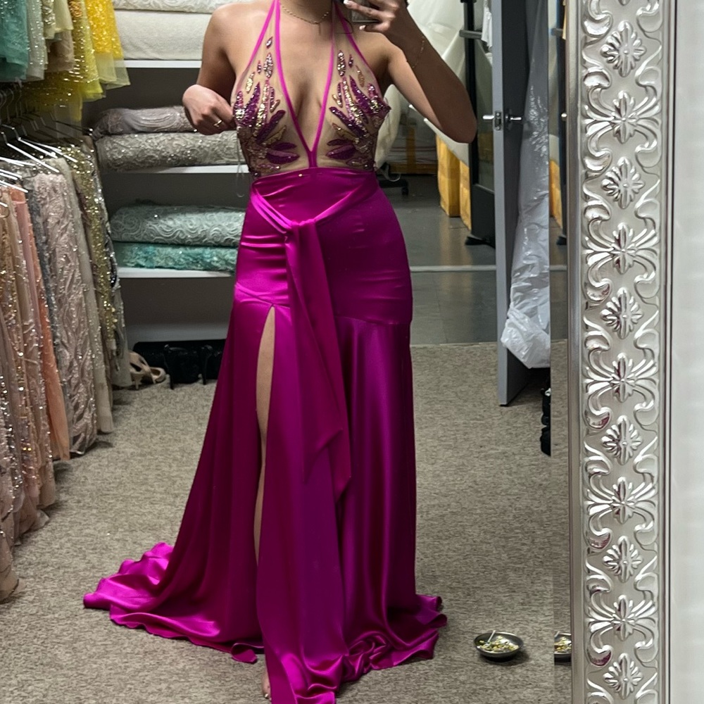 Never worn, originally bought for a close wedding